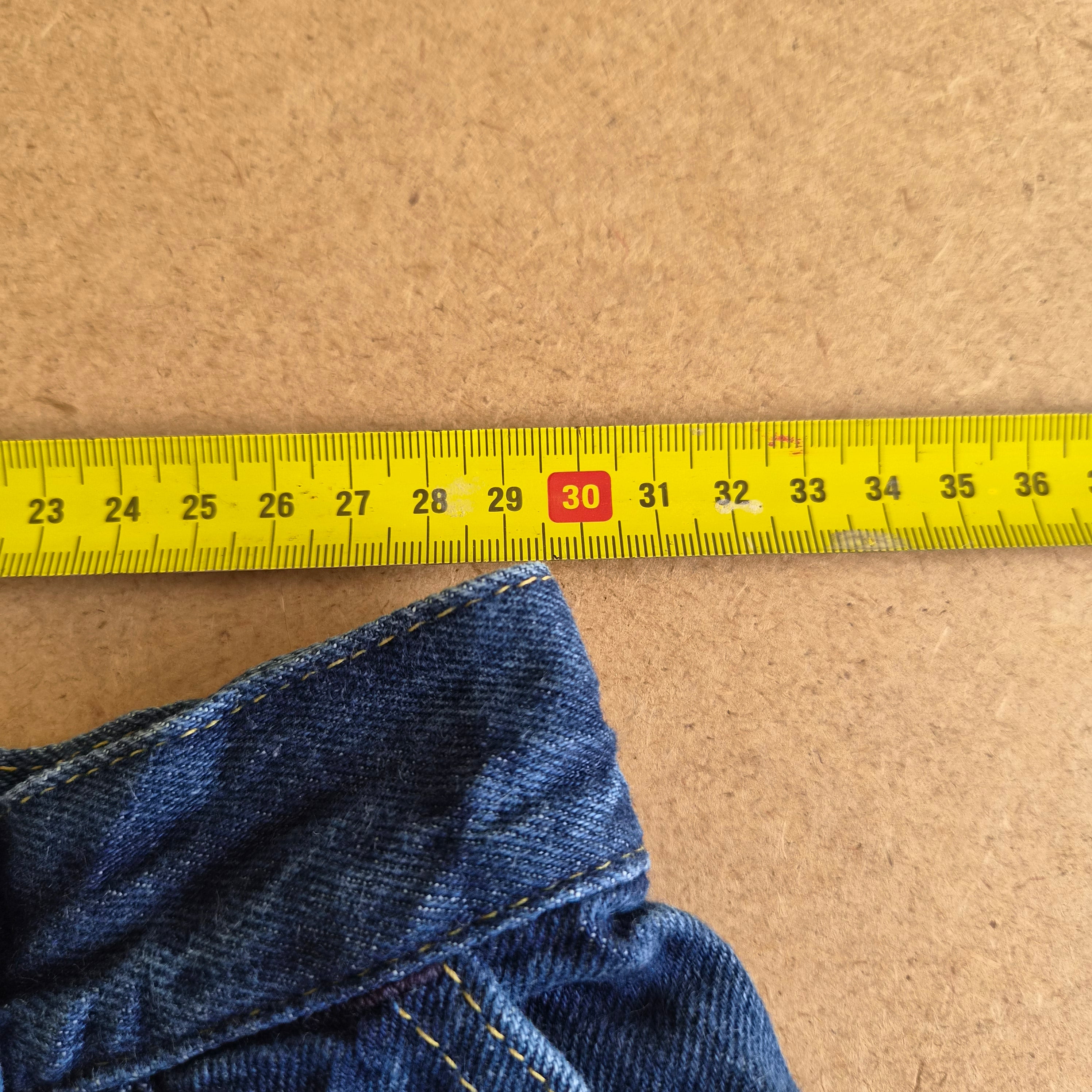 Jean taille haute vintage Lee — 32/34 FR — Très bon état