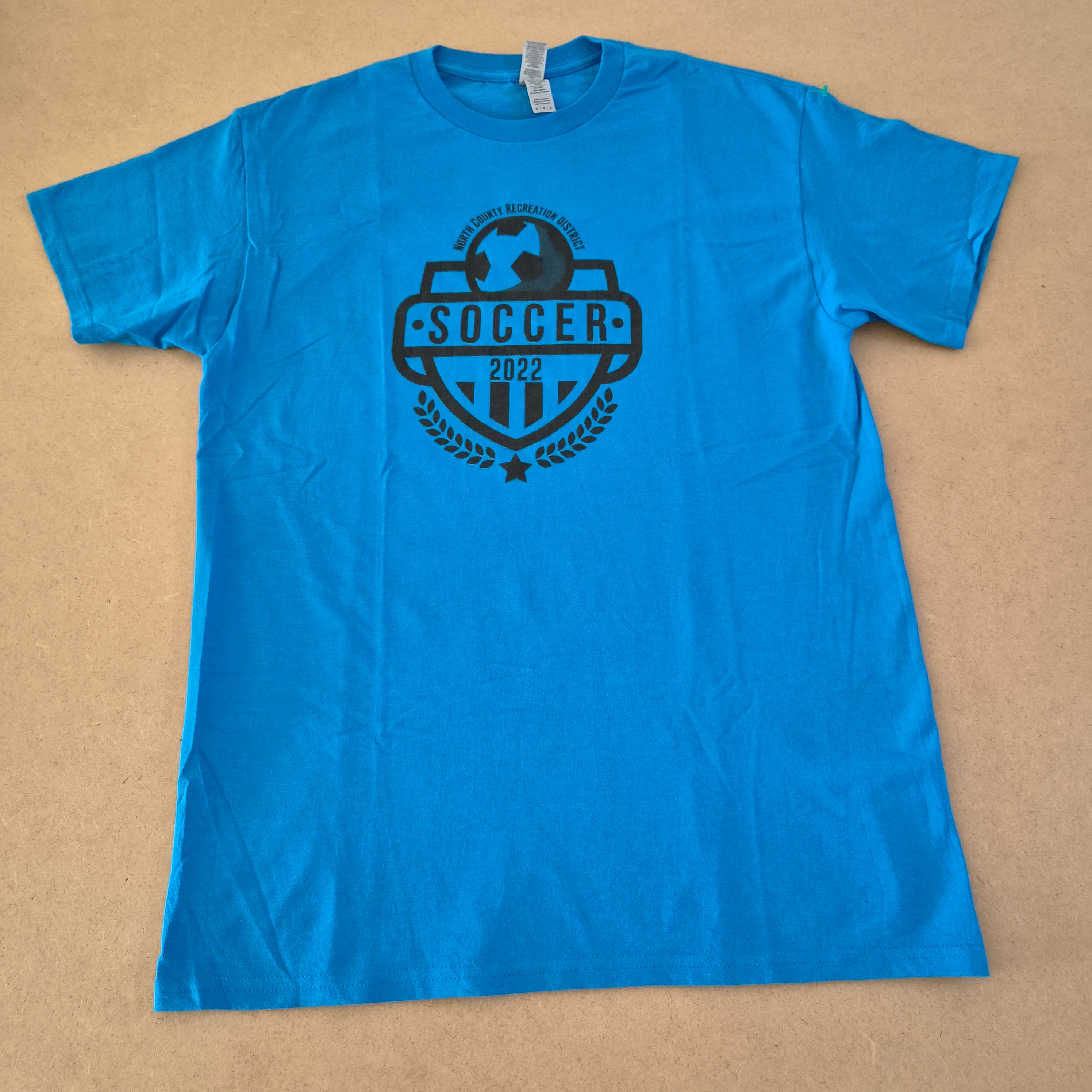 T-shirt Gildan Soccer 2022 Coach Bleu Turquoise — North County Recreation District Fresh Foods — M — Très bon état