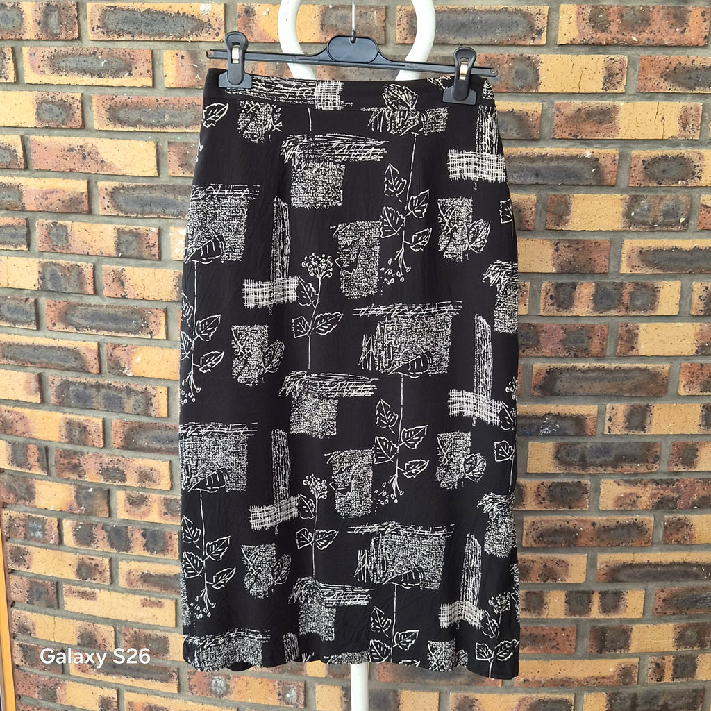 Jupe longue vintage Mones of Dallas Sport noire fleurie M USA 36FR